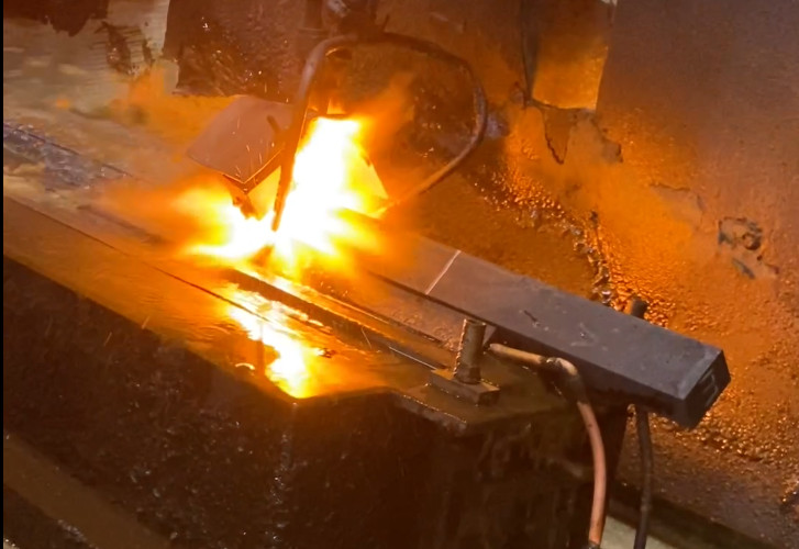 Thermal Monitoring in Flame Hardening Seeing Through Flames with Infrared Sensors